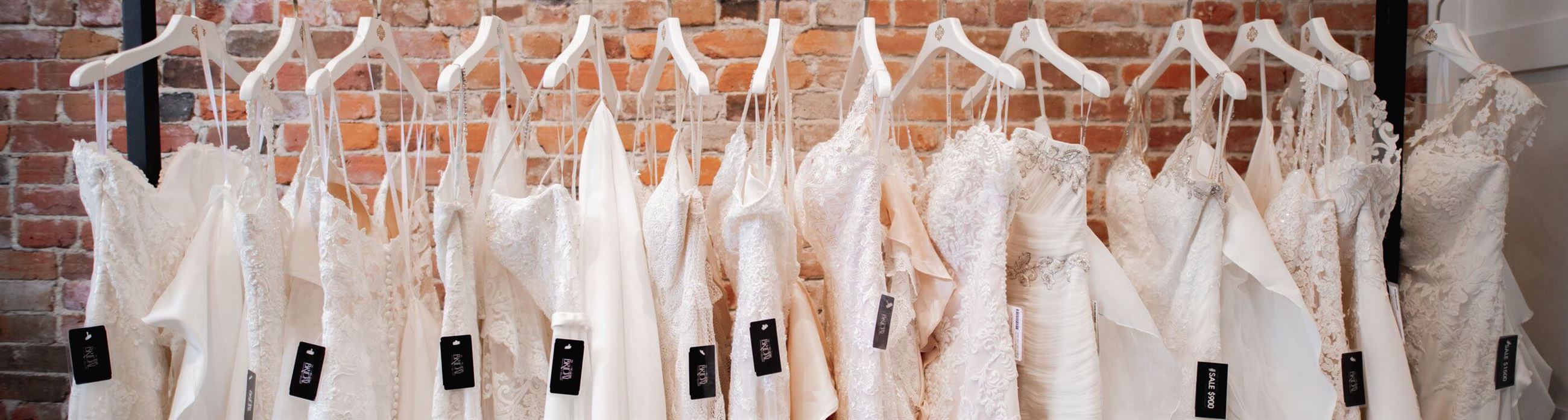 Wedding dresses on racks