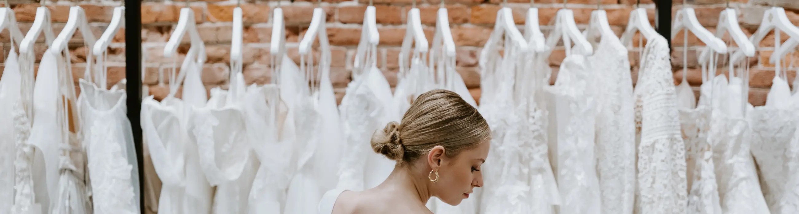 Wedding dresses on racks